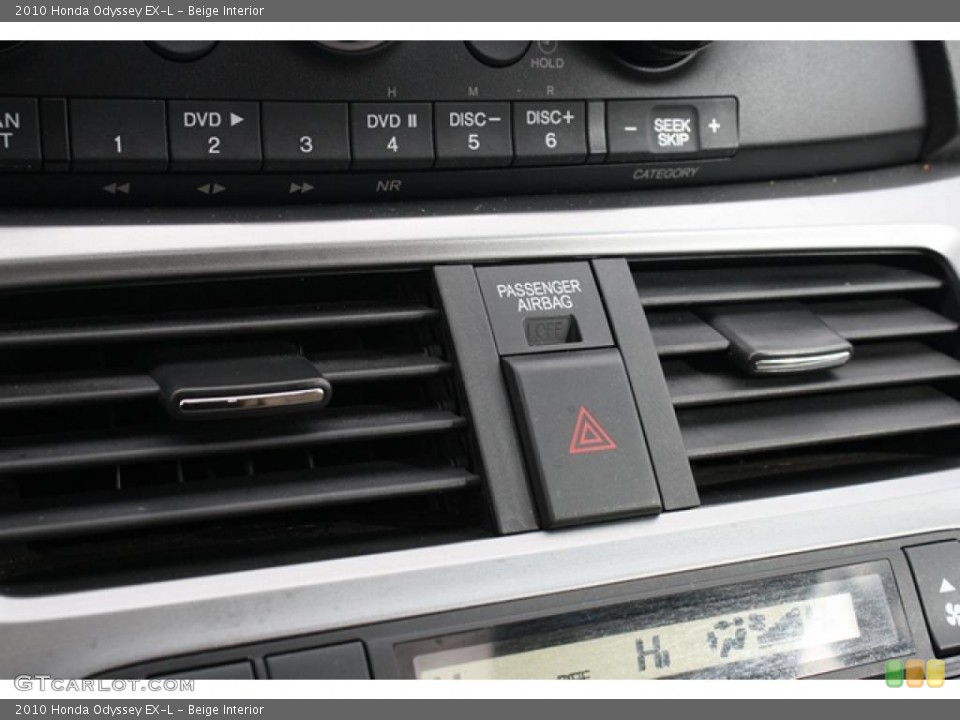 Beige Interior Controls for the 2010 Honda Odyssey EX-L #47307986