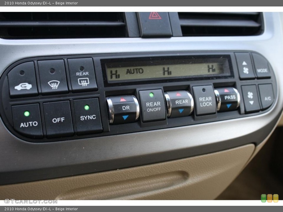 Beige Interior Controls for the 2010 Honda Odyssey EX-L #47308001