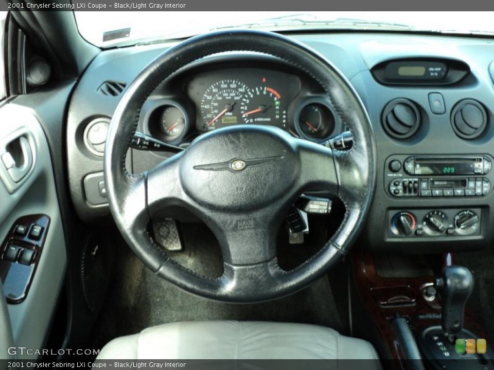 Black/Light Gray Interior Steering Wheel for the 2001 Chrysler Sebring LXi Coupe #47319935