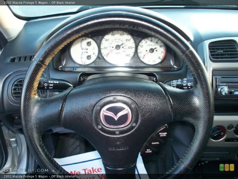 Off Black Interior Steering Wheel for the 2002 Mazda Protege 5 Wagon #47320790