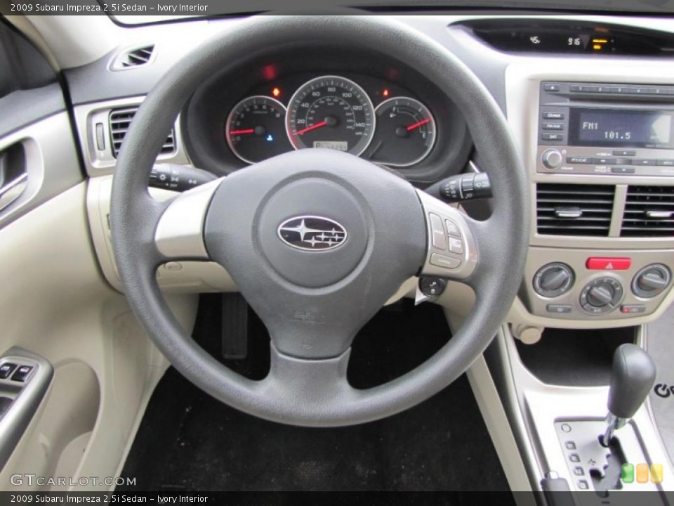 Ivory Interior Steering Wheel for the 2009 Subaru Impreza 2.5i Sedan #47335597