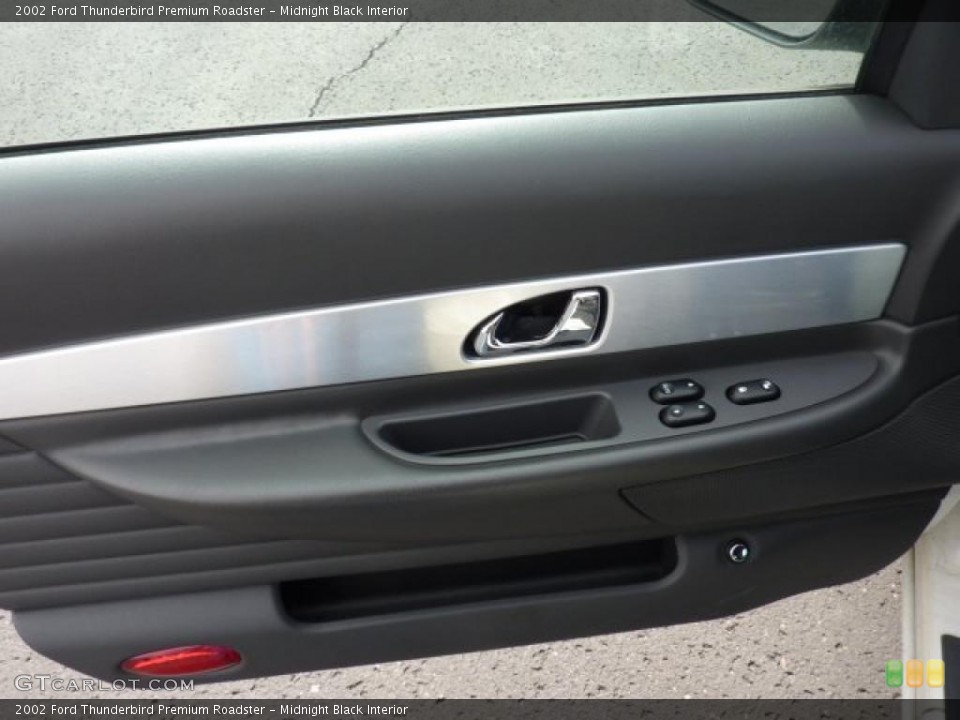 Midnight Black Interior Door Panel for the 2002 Ford Thunderbird Premium Roadster #47336680