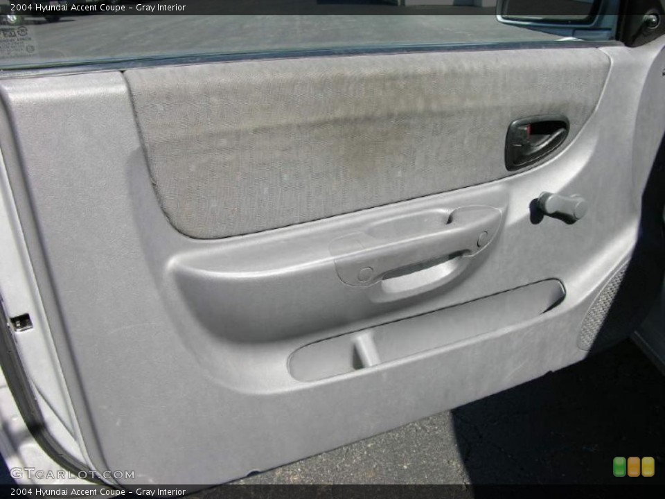 Gray Interior Door Panel for the 2004 Hyundai Accent Coupe #47343053