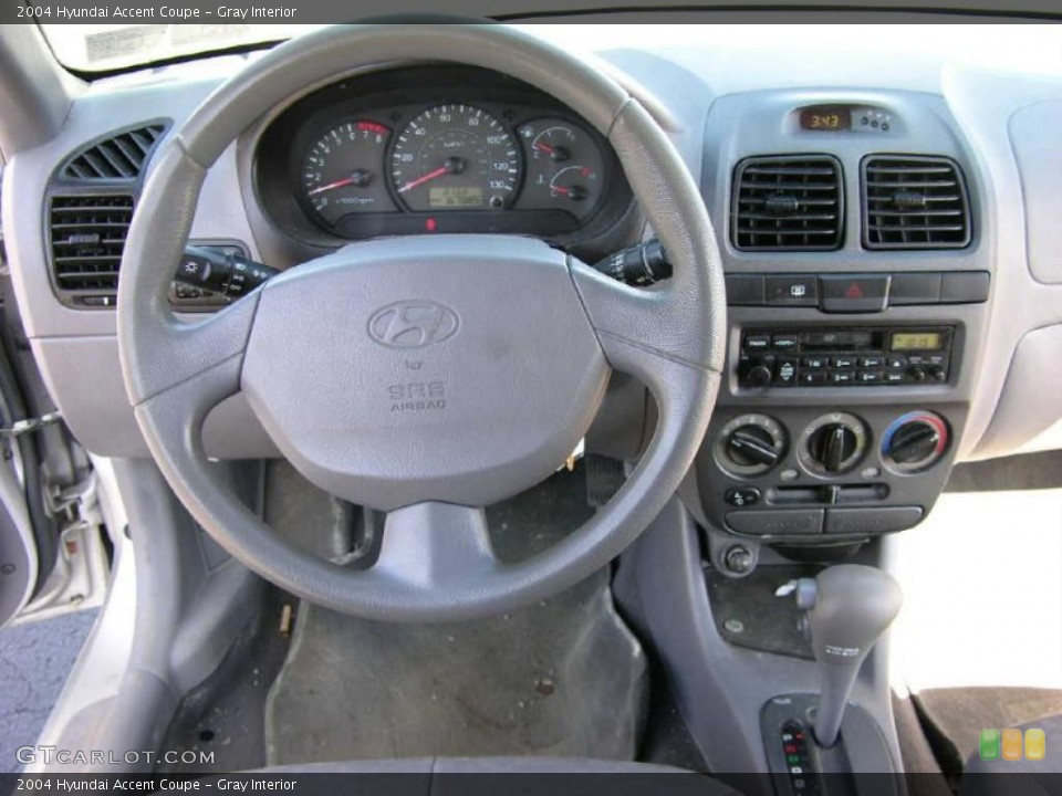 Gray Interior Dashboard for the 2004 Hyundai Accent Coupe #47343143