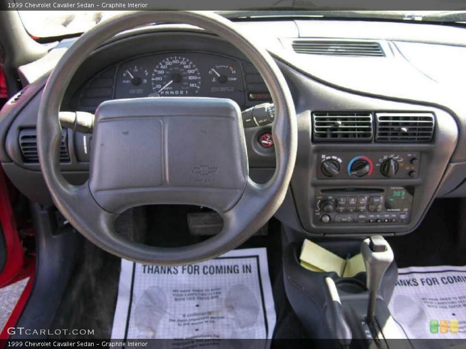 Graphite Interior Dashboard for the 1999 Chevrolet Cavalier Sedan #47345441