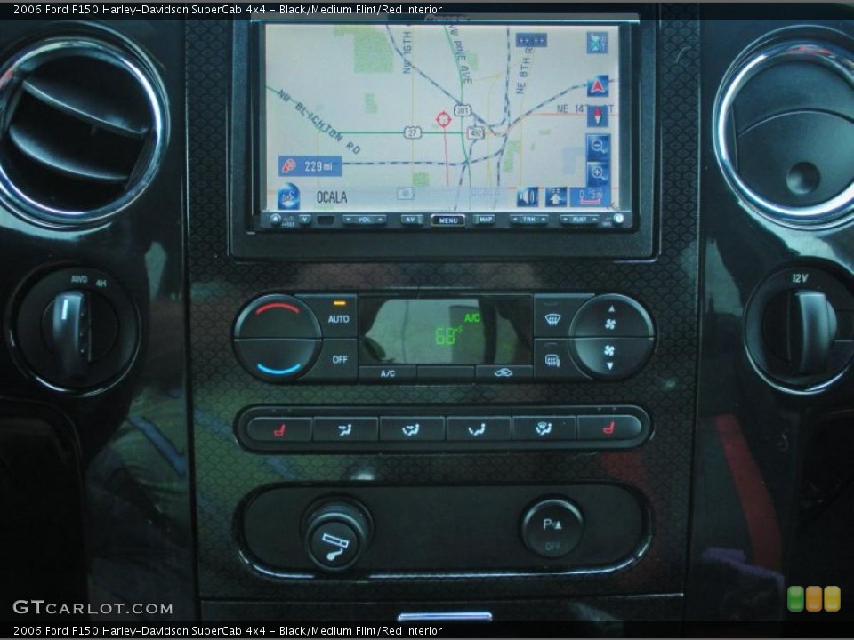 Black/Medium Flint/Red Interior Navigation for the 2006 Ford F150 Harley-Davidson SuperCab 4x4 #47353409