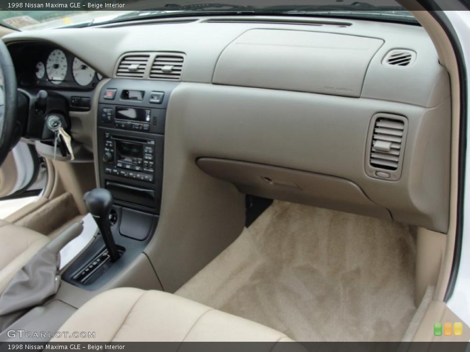 Beige Interior Dashboard for the 1998 Nissan Maxima GLE #47358368