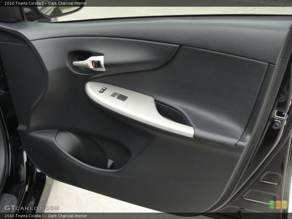 Dark Charcoal Interior Door Panel for the 2010 Toyota Corolla S #47365643