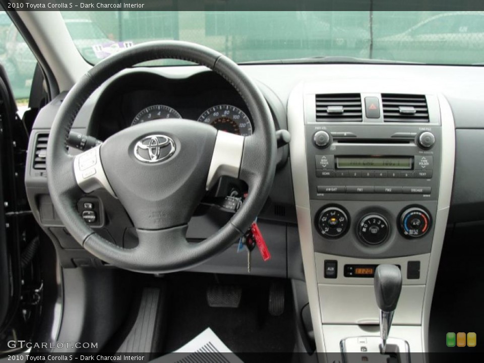 Dark Charcoal Interior Steering Wheel for the 2010 Toyota Corolla S #47365814