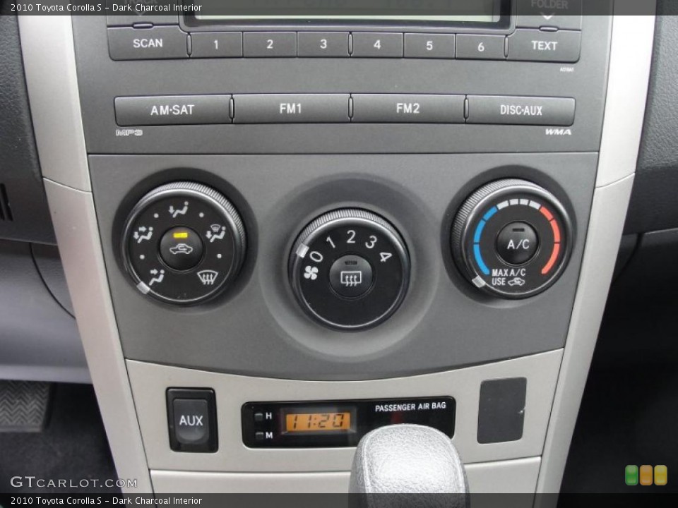 Dark Charcoal Interior Controls for the 2010 Toyota Corolla S #47365856