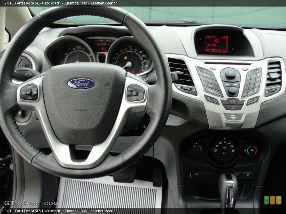 Charcoal Black Leather Interior Steering Wheel for the 2011 Ford Fiesta SES Hatchback #47367320