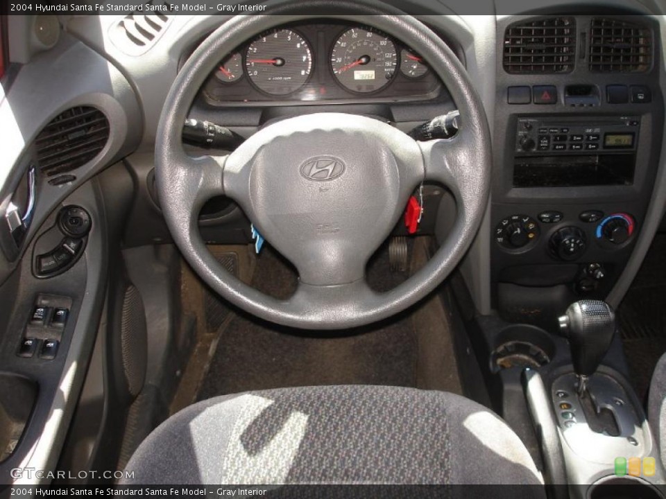 Gray Interior Steering Wheel for the 2004 Hyundai Santa Fe  #47369417