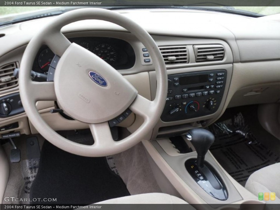 Medium Parchment Interior Dashboard for the 2004 Ford Taurus SE Sedan #47372429