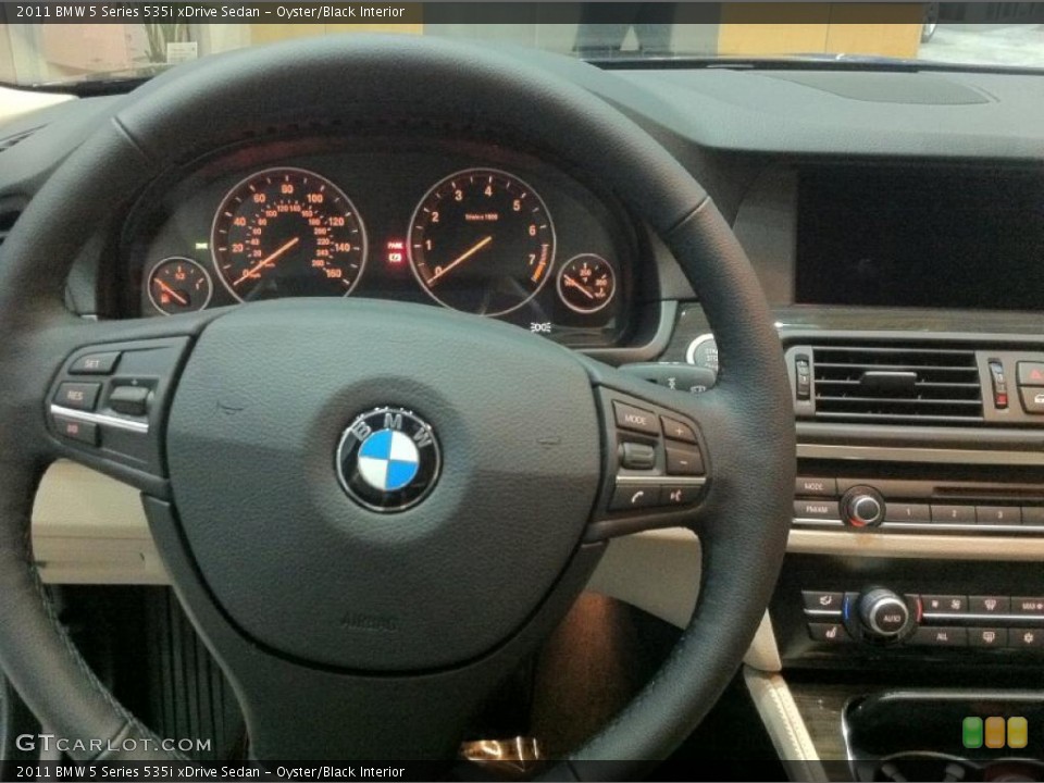 Oyster/Black Interior Steering Wheel for the 2011 BMW 5 Series 535i xDrive Sedan #47377757