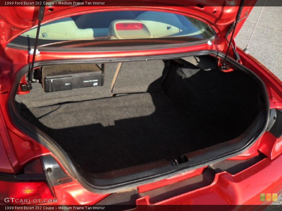 Medium Prairie Tan Interior Trunk for the 1999 Ford Escort ZX2 Coupe #47382563