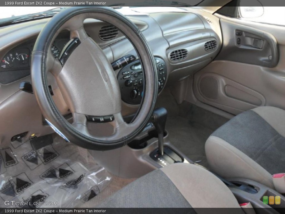 Medium Prairie Tan Interior Prime Interior for the 1999 Ford Escort ZX2 Coupe #47382695