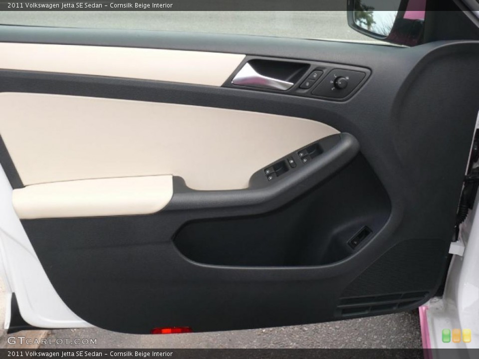 Cornsilk Beige Interior Door Panel for the 2011 Volkswagen Jetta SE Sedan #47389676