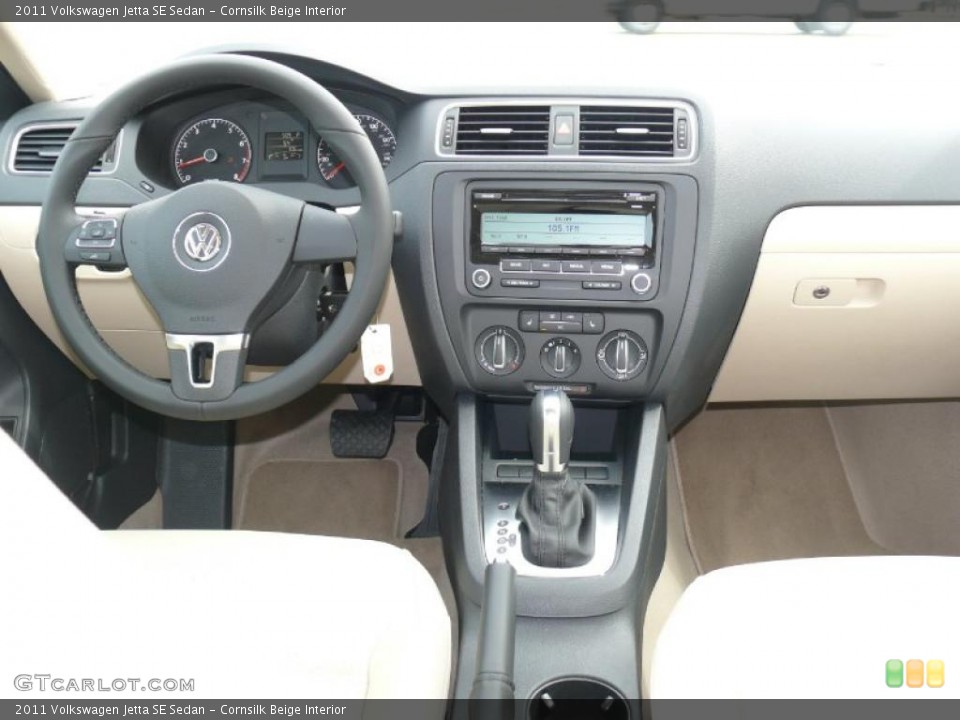 Cornsilk Beige Interior Dashboard for the 2011 Volkswagen Jetta SE Sedan #47389712