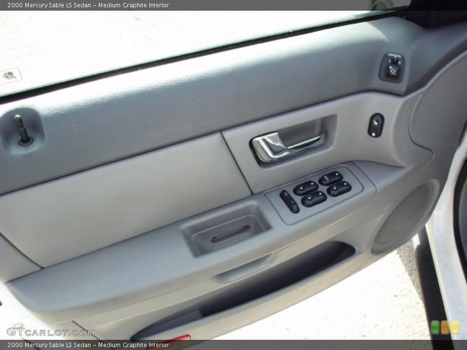 Medium Graphite Interior Door Panel for the 2000 Mercury Sable LS Sedan #47392553