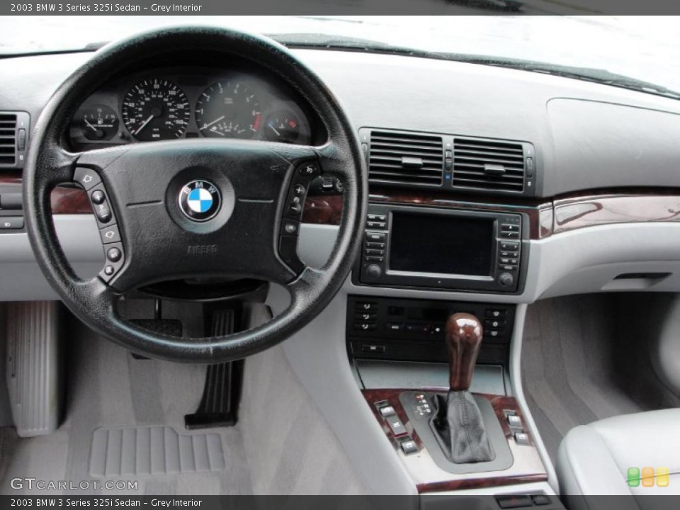 Grey Interior Dashboard for the 2003 BMW 3 Series 325i Sedan #47412560