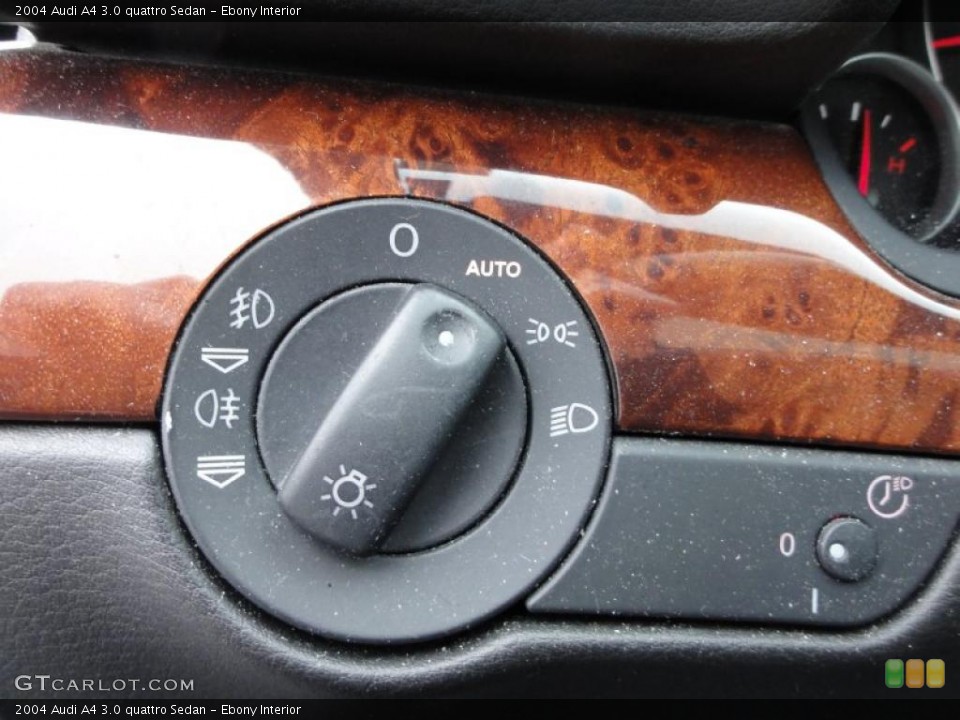 Ebony Interior Controls for the 2004 Audi A4 3.0 quattro Sedan #47421996