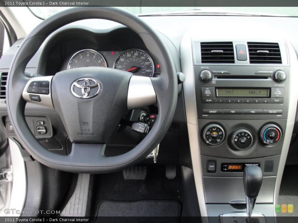 Dark Charcoal Interior Steering Wheel for the 2011 Toyota Corolla S #47425758