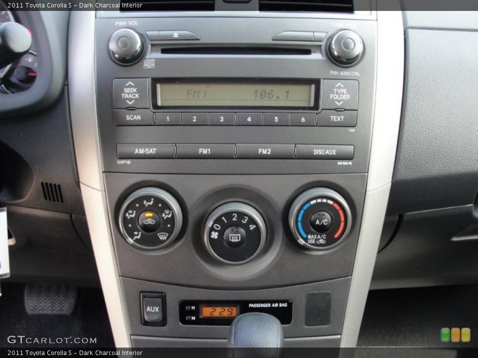 Dark Charcoal Interior Controls for the 2011 Toyota Corolla S #47425773