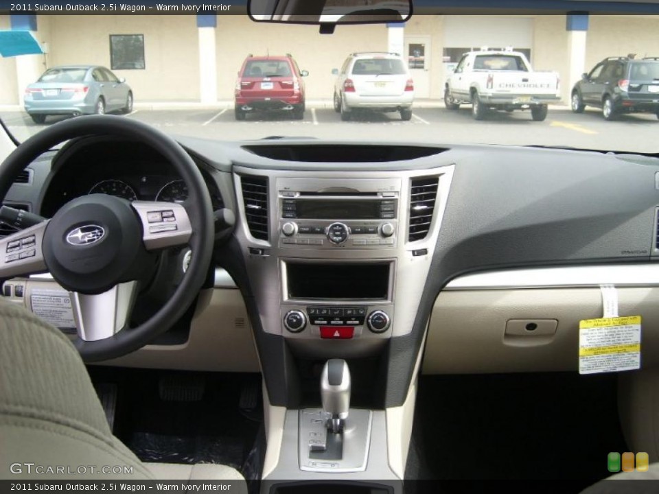 Warm Ivory Interior Dashboard for the 2011 Subaru Outback 2.5i Wagon #47425929