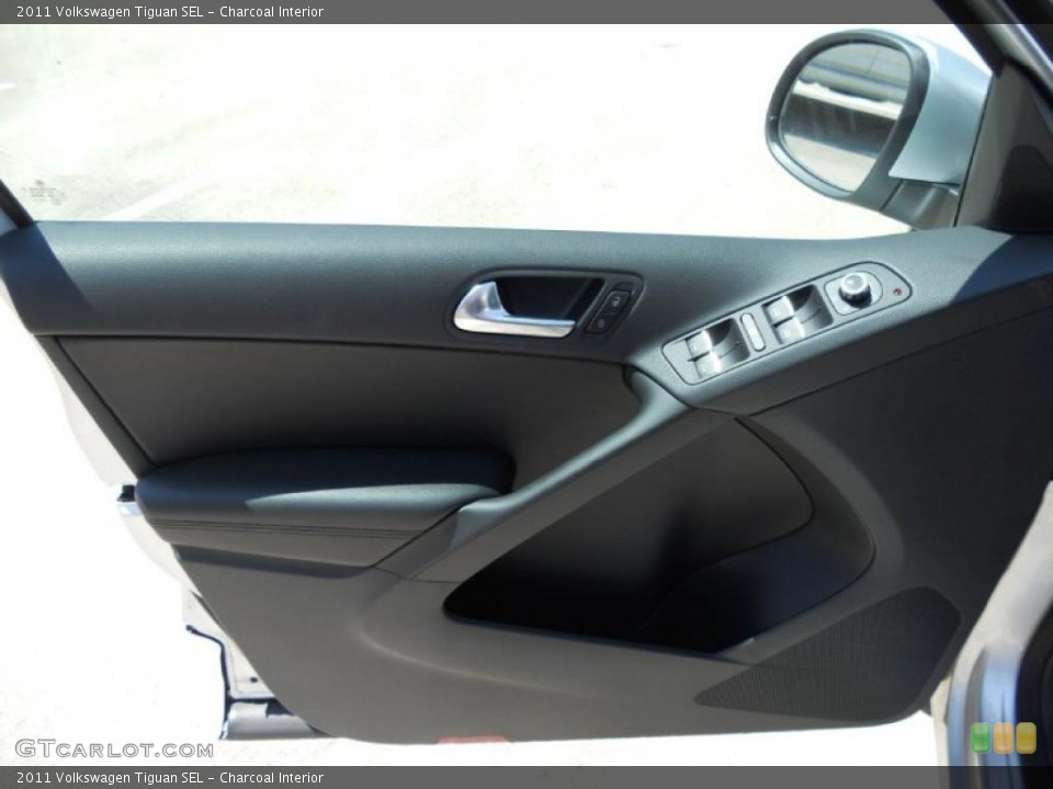 Charcoal Interior Door Panel for the 2011 Volkswagen Tiguan SEL #47434785