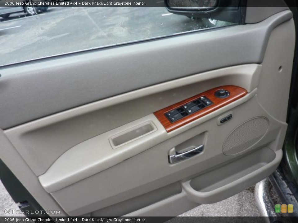 Dark Khaki/Light Graystone Interior Door Panel for the 2006 Jeep Grand Cherokee Limited 4x4 #47440239