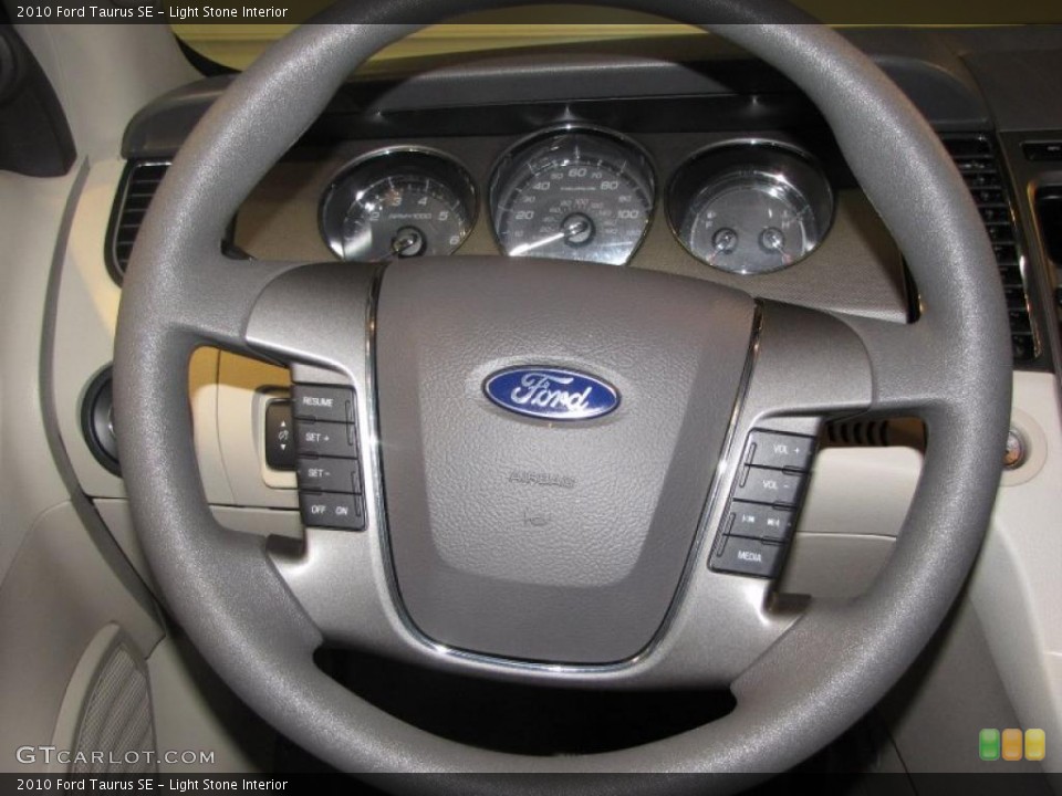 Light Stone Interior Steering Wheel for the 2010 Ford Taurus SE #47443638