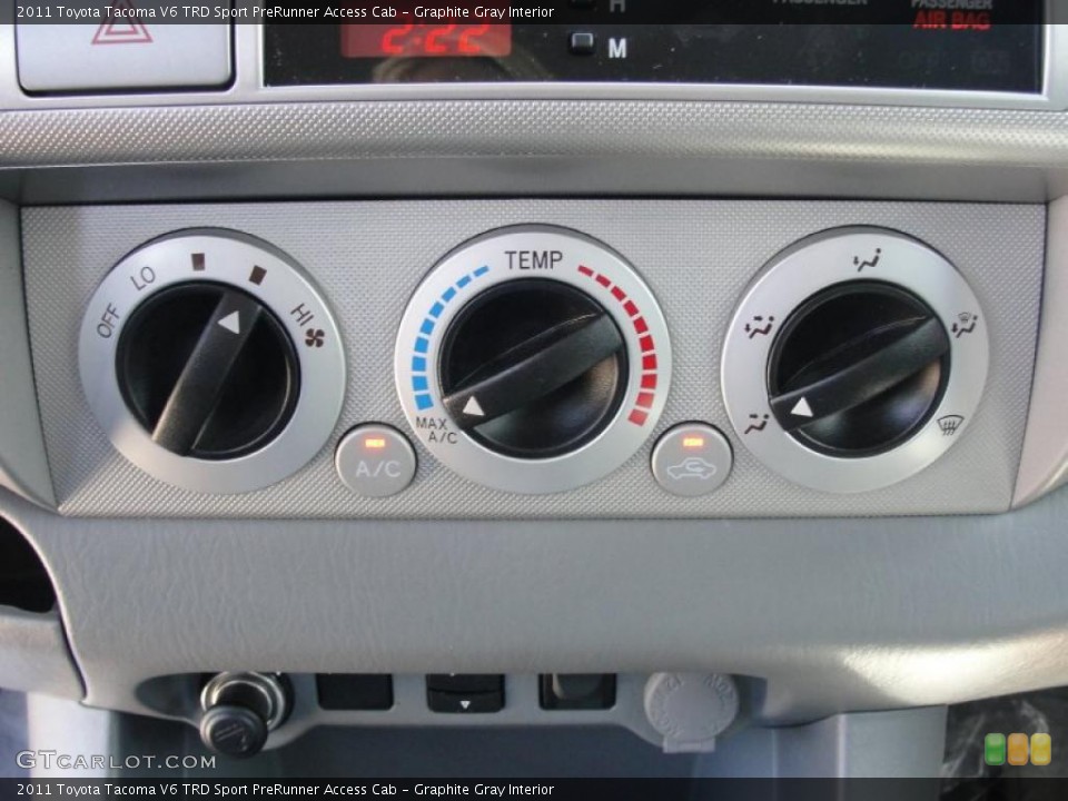 Graphite Gray Interior Controls for the 2011 Toyota Tacoma V6 TRD Sport PreRunner Access Cab #47459866