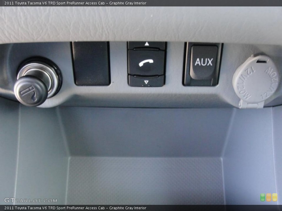 Graphite Gray Interior Controls for the 2011 Toyota Tacoma V6 TRD Sport PreRunner Access Cab #47459878