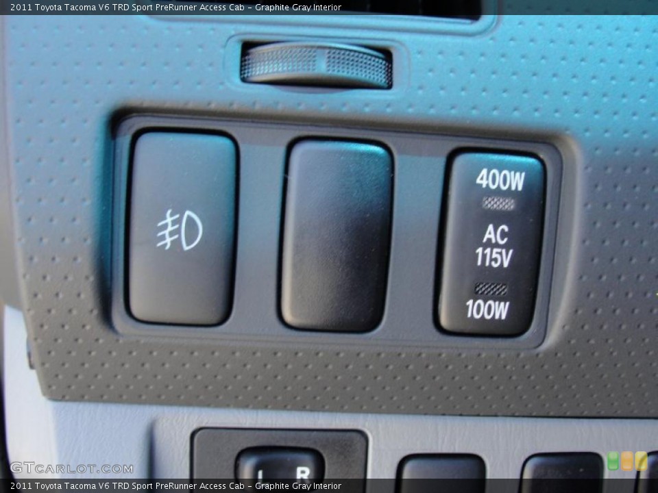 Graphite Gray Interior Controls for the 2011 Toyota Tacoma V6 TRD Sport PreRunner Access Cab #47459929