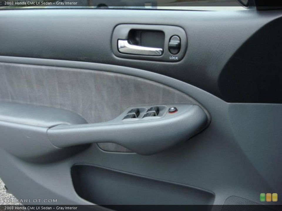Gray Interior Door Panel for the 2003 Honda Civic LX Sedan #47484260