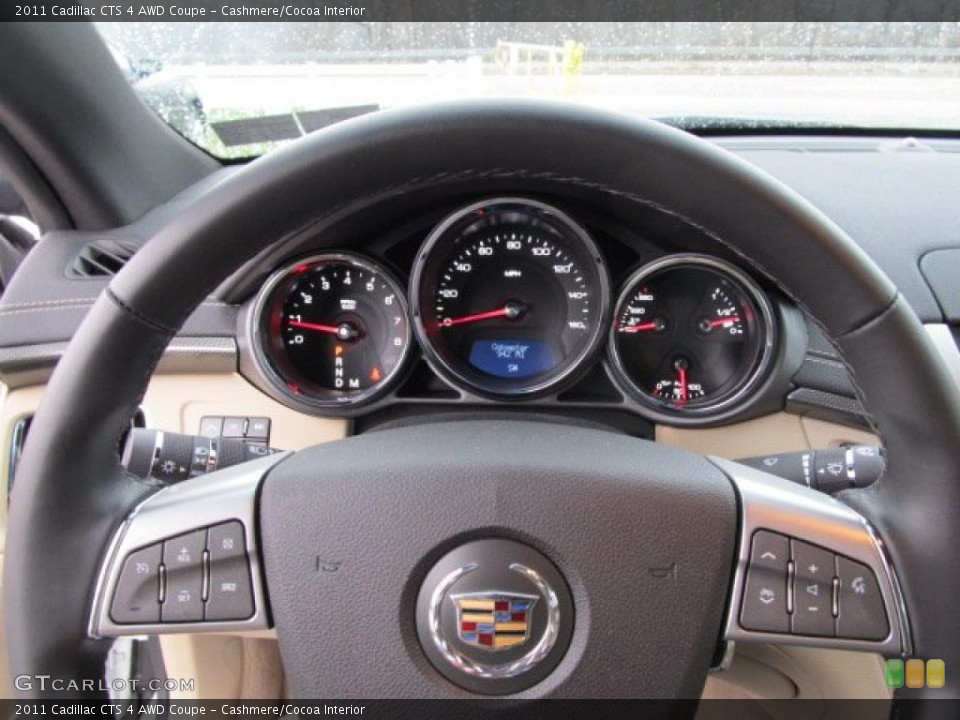Cashmere/Cocoa Interior Controls for the 2011 Cadillac CTS 4 AWD Coupe #47489319