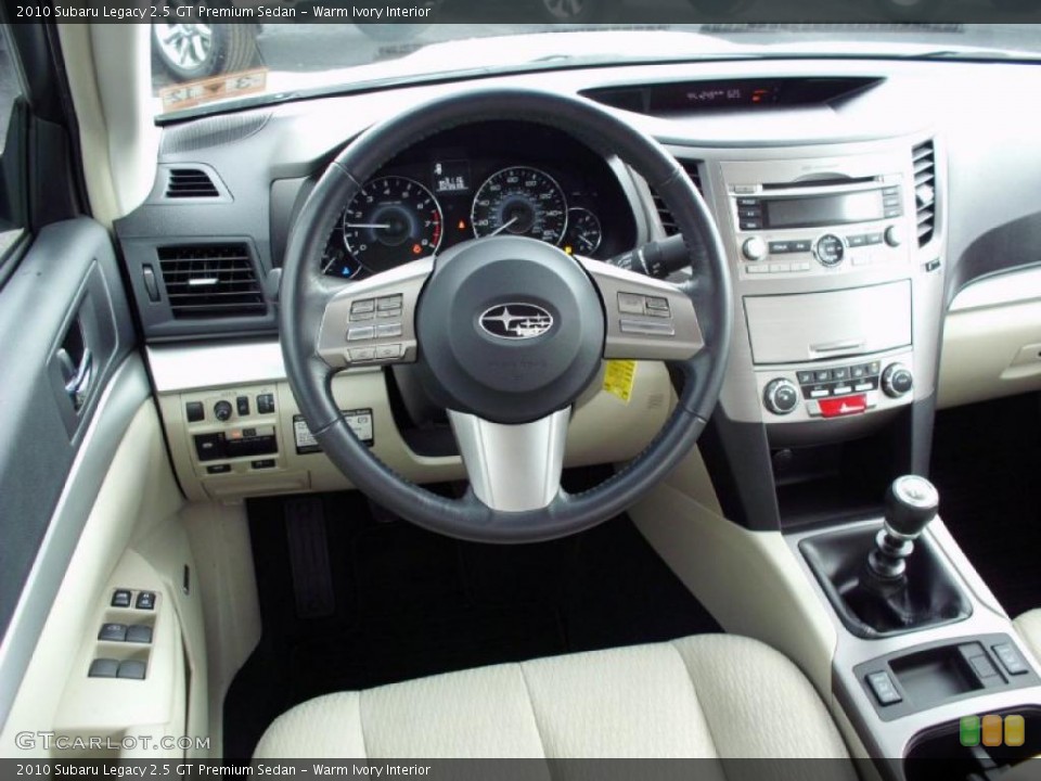 Warm Ivory Interior Dashboard for the 2010 Subaru Legacy 2.5 GT Premium Sedan #47490882