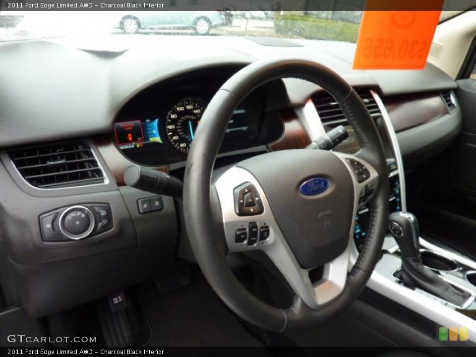 Charcoal Black Interior Steering Wheel for the 2011 Ford Edge Limited AWD #47494902
