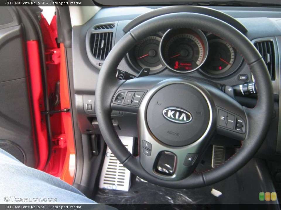 Black Sport Interior Steering Wheel for the 2011 Kia Forte Koup SX #47497227