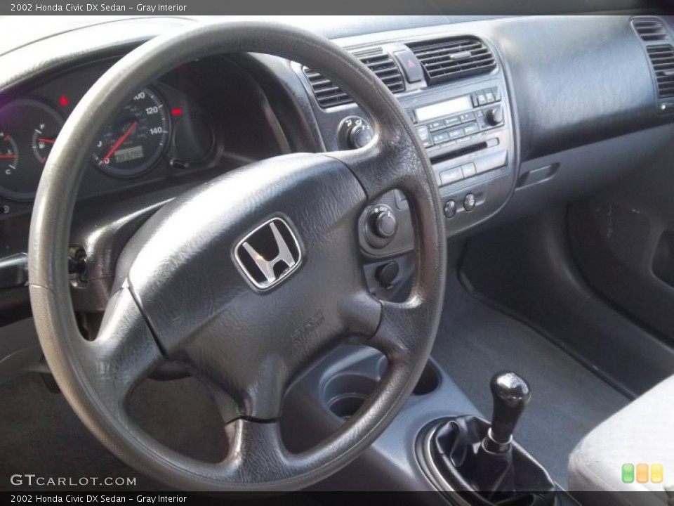 Gray Interior Steering Wheel for the 2002 Honda Civic DX Sedan #47512861
