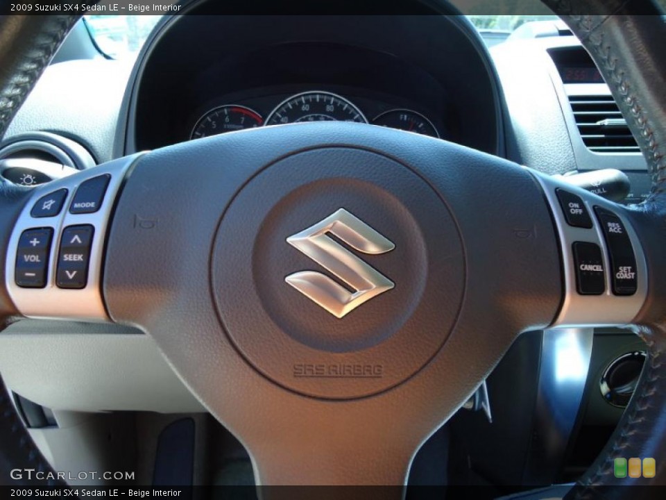 Beige Interior Controls for the 2009 Suzuki SX4 Sedan LE #47515681