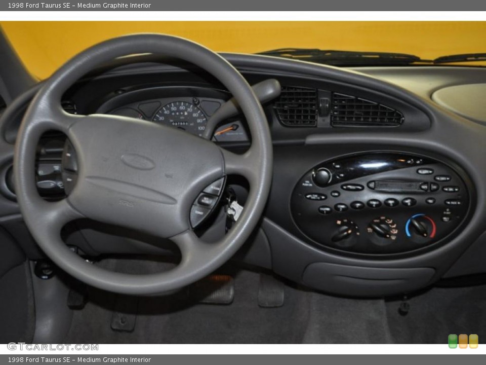 Medium Graphite Interior Dashboard for the 1998 Ford Taurus SE #47548652