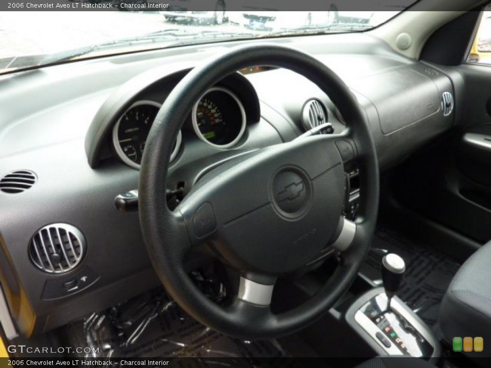 Charcoal Interior Steering Wheel for the 2006 Chevrolet Aveo LT Hatchback #47549084