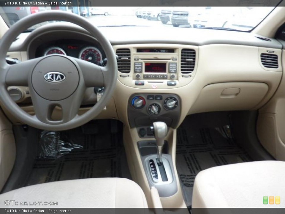 Beige Interior Dashboard for the 2010 Kia Rio LX Sedan #47550633