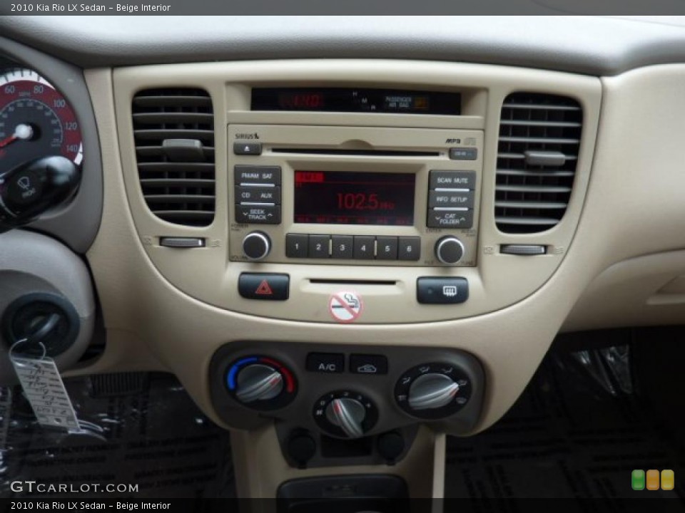 Beige Interior Controls for the 2010 Kia Rio LX Sedan #47550725