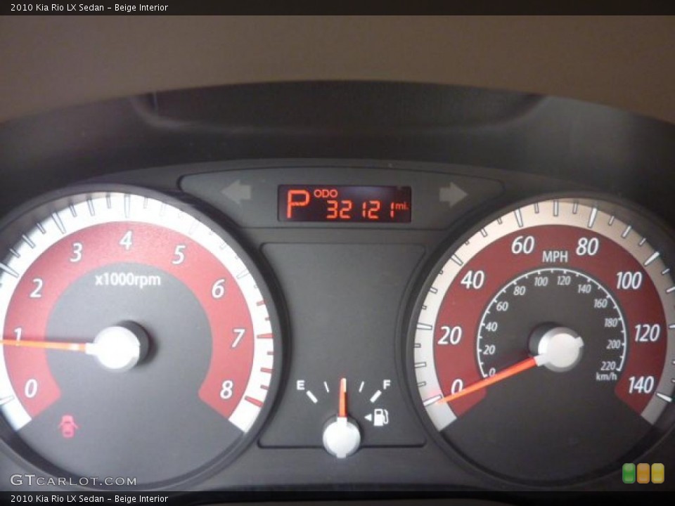Beige Interior Gauges for the 2010 Kia Rio LX Sedan #47550743