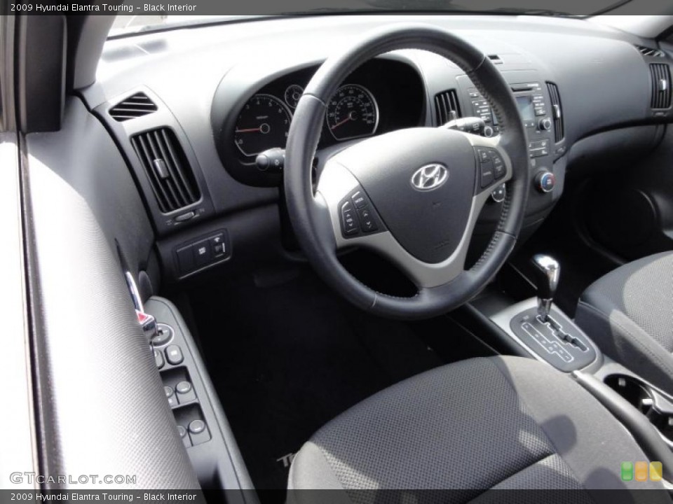 Black Interior Steering Wheel for the 2009 Hyundai Elantra Touring #47555066