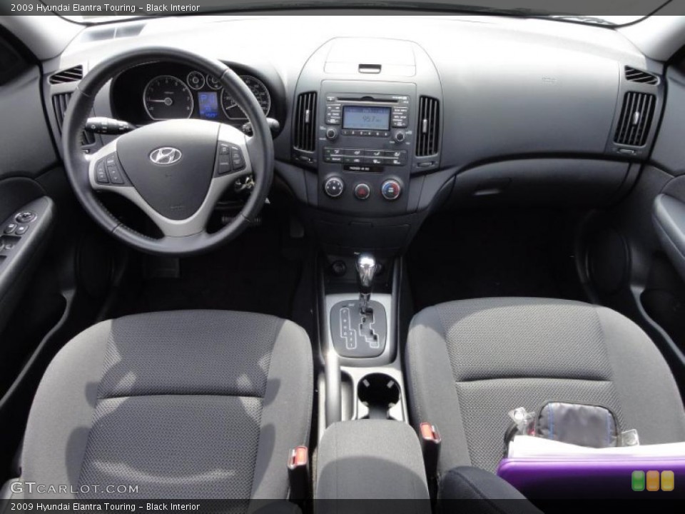 Black Interior Dashboard for the 2009 Hyundai Elantra Touring #47555282