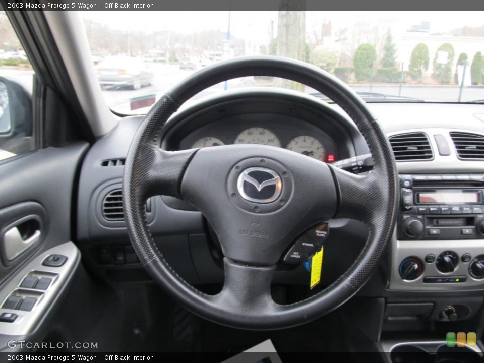 Off Black Interior Steering Wheel for the 2003 Mazda Protege 5 Wagon #47587780