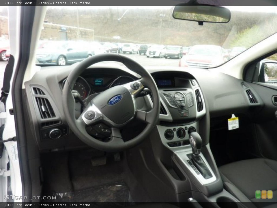 Charcoal Black Interior Dashboard for the 2012 Ford Focus SE Sedan #47596468